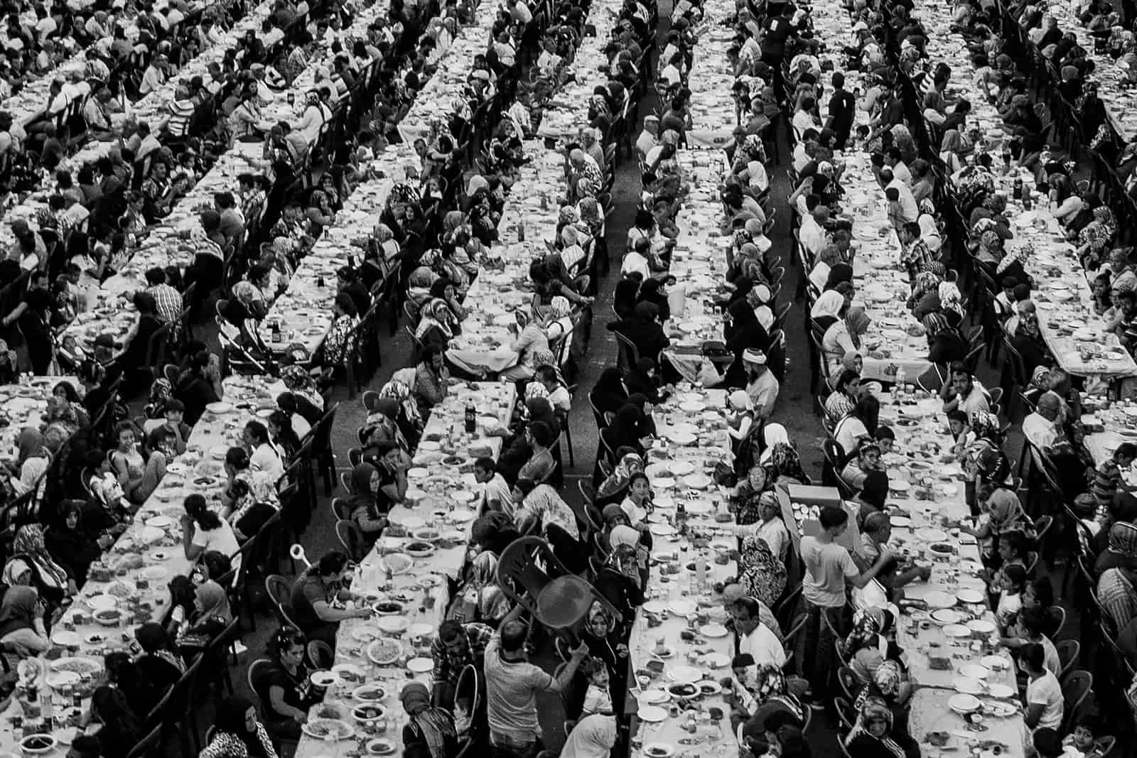 A long dining table set for a large gathering
