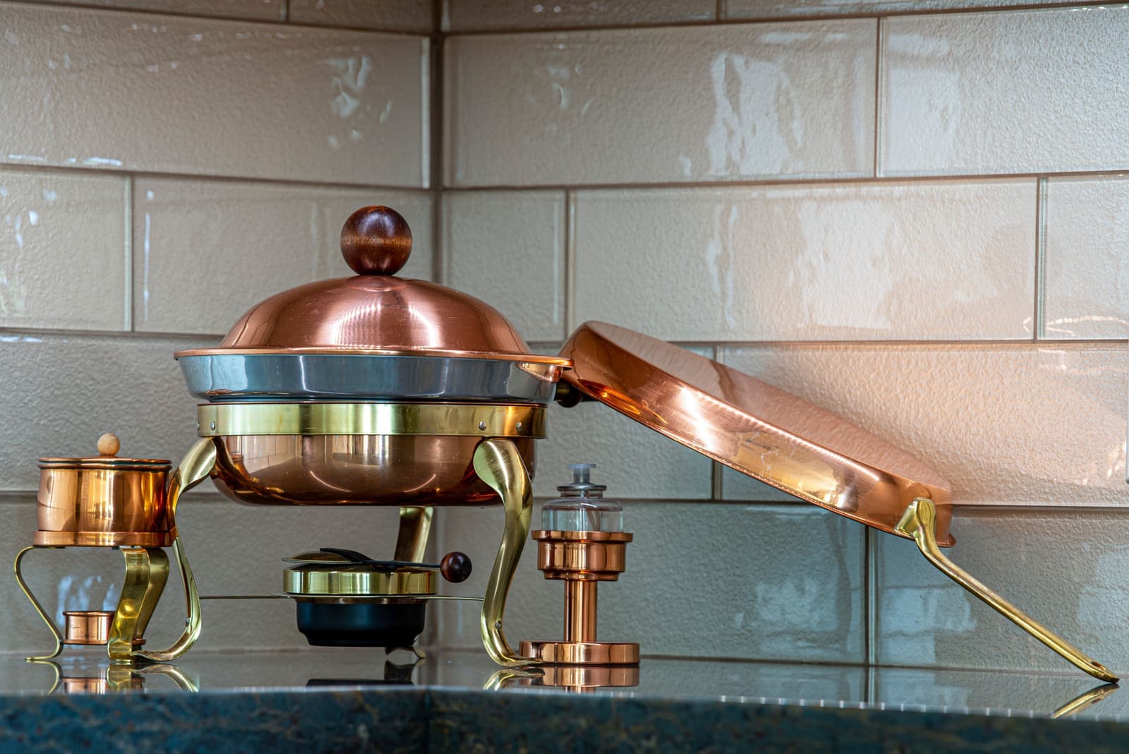 Chafing dishes set out on a serving table