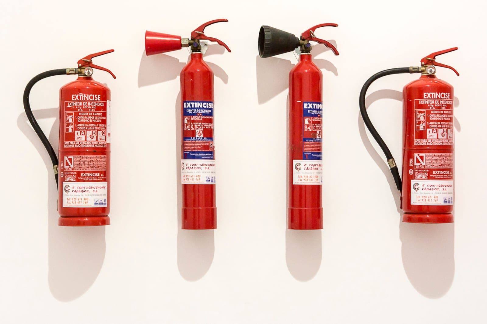 A fire extinguisher mounted ready for use