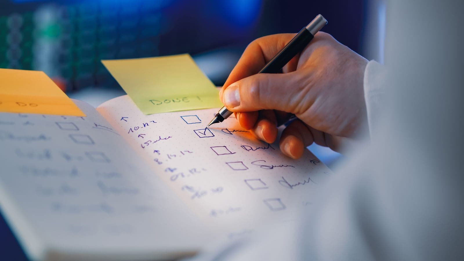 A notebook and pen laid out for planning