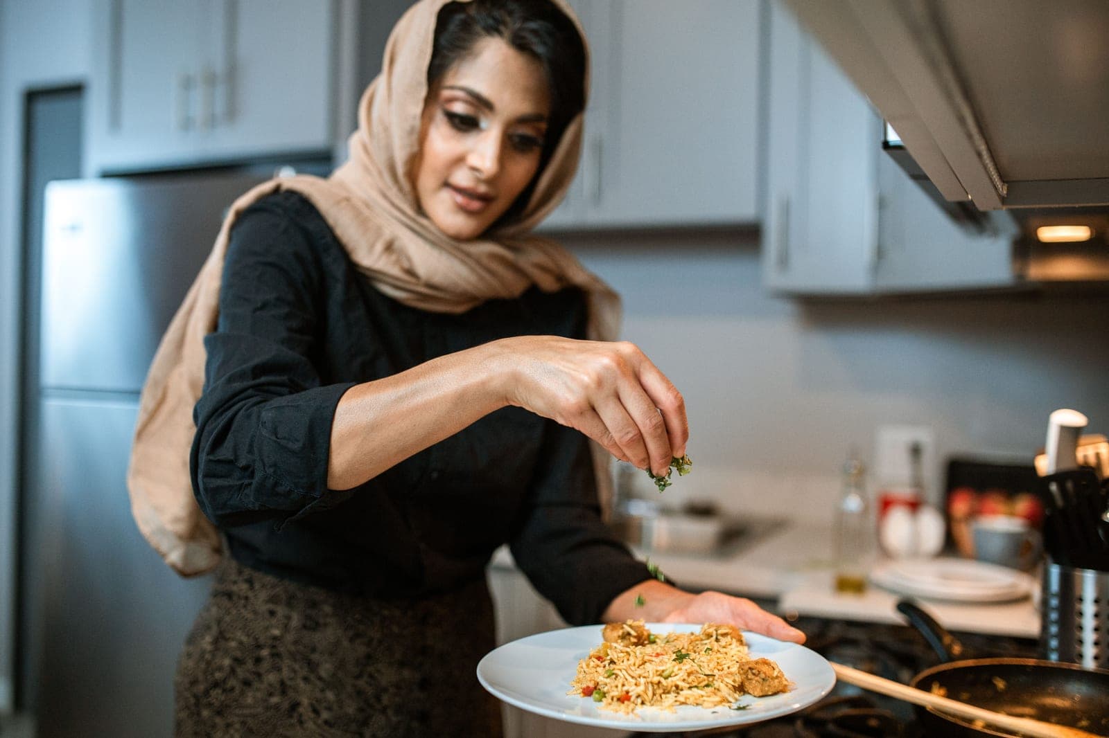 Someone cooking in a home kitchen during holiday preparation