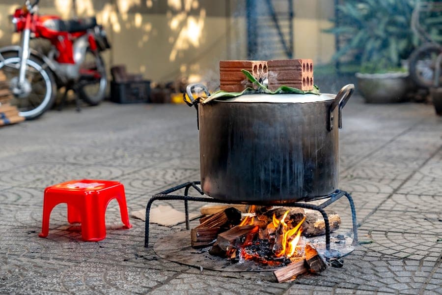 A large stainless steel stock pot