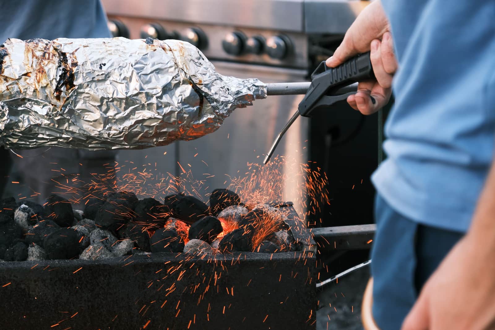 A disposable foil roasting pan on a kitchen surface