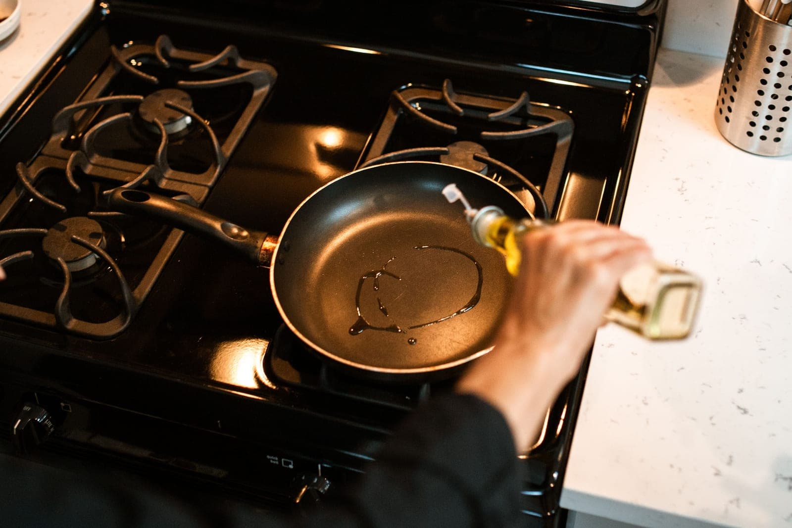 Cooking oil being poured from a bottle